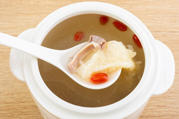 A bowl of pork belly and fish maw stew
