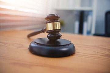 Judge hammer or gavel on office desk Law and justice concept, legal advice for business employee human working rights and regulation in work environment, law and order in society for justification