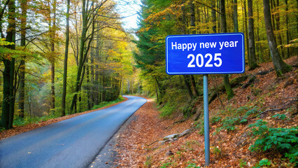 A serene forest road with a blue sign welcoming the new year 2025 amid colorful autumn foliage