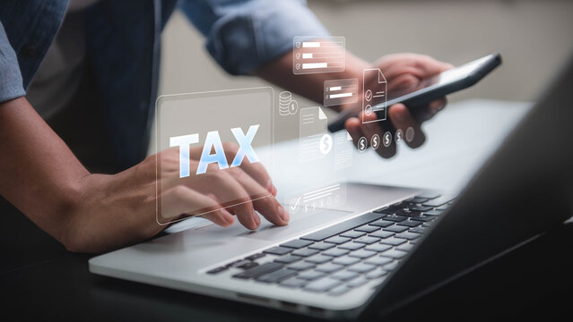 Tax Filing Online concept, hands using a laptop and smartphone with digital tax documents, symbolizing the process of online tax filing and management.