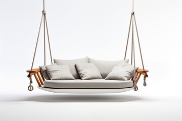 white swing sofa with no embellishments, suspended by thin, nearly invisible metal chains. The background is a blank white space, with the focus entirely on elegant simplicity of  sofa&rsquo;s clean lines