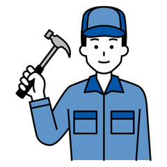 ハンマーを持つつなぎ作業服の男性