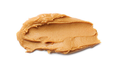 Tasty peanut butter isolated on white, top view