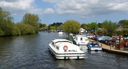 Naklejka premium Boards cruiser on the river Bure at Horning