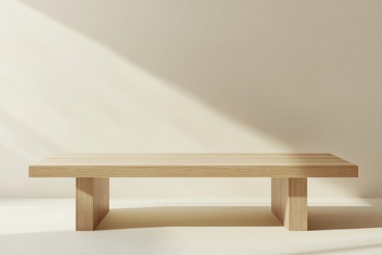 Wooden Table Against a Light Beige Wall with Sunlight