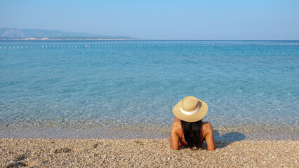 Relaxing by the tranquil waters of Brac Island, Croatia on a sunny day