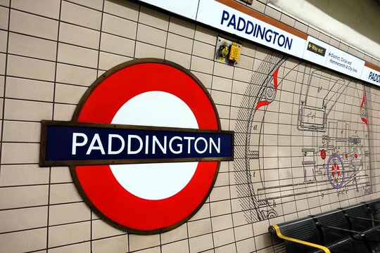 Paddington station roundel sign, other signage and tile artwork