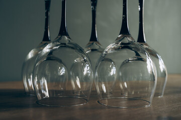 A festive assortment of wine glasses on a clean table, ready for a luxury wine tasting event at a high-end restaurant.