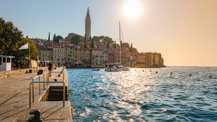 Golden sunset over Rovinj's vibrant waterfront and bobbing boats in the calm Adriatic © Fokke Baarssen