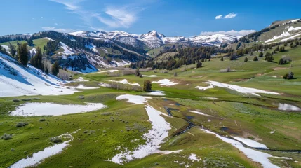 Snow-capped Mountains and Lush Green Valley © Imsuniyah