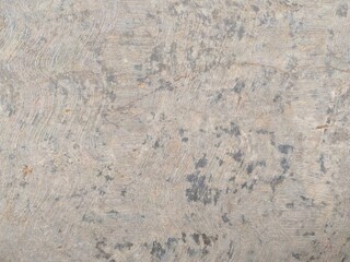Cement floors are rough-textured and have visible splotches 