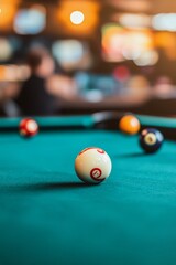A focused shot of a billiard table with balls ready for a game in a lively bar setting