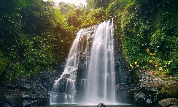 waterfall on deep tropical forest, thailand, nature background