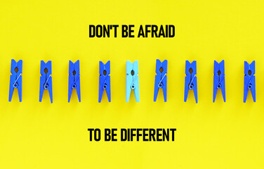Don't Be Afraid To Be Different. Motivational quote is shown using the text