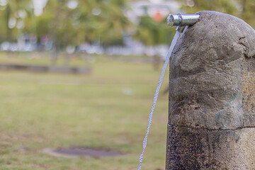 Naklejka premium Water tap in a public park