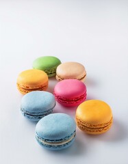 Obraz premium colorful macarons and white background 