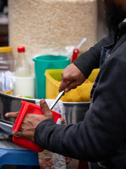 Urban Culinary Experience: Close-Up of Food Stall Preparation in Bangladesh