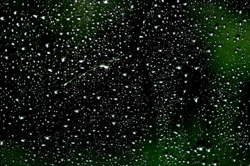 raindrops on window on car windshield	