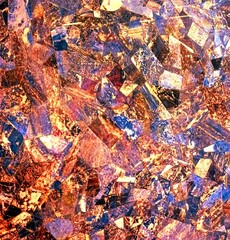 Abstract Colorful Mosaic of Geometric Stone Patterns with Vibrant Orange and Blue Hues. Foto