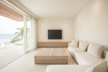 Modern living room with a coastal view featuring a sleek sofa and minimalist decor
