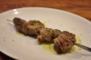 Italian cuisine: spiedino di agnello (grilled lamb skewer)