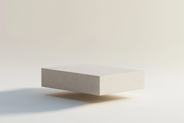 A Single White Concrete Platform Floating in a White Room