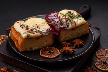 Delicious sweet brioche sandwich with raspberry jam and ricotta cream