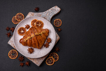 Fresh crispy croissant filled with pistachio cream
