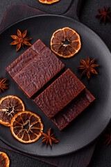 Rectangular chocolate candies with mousse and waffles