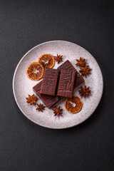 Rectangular chocolate candies with mousse and waffles