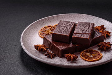 Rectangular chocolate candies with mousse and waffles