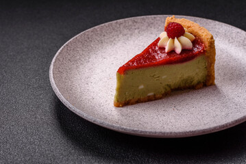 Delicious sweet dessert cheesecake with raspberry and pistachio flavor