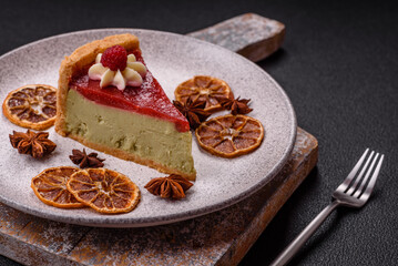 Delicious sweet dessert cheesecake with raspberry and pistachio flavor