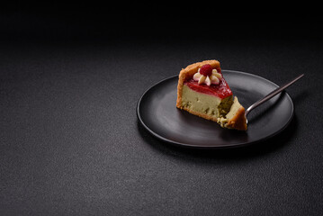 Delicious sweet dessert cheesecake with raspberry and pistachio flavor