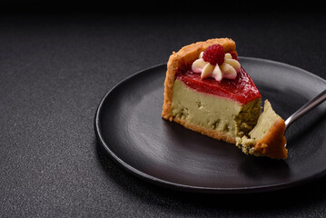 Delicious sweet dessert cheesecake with raspberry and pistachio flavor