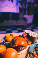 Joyful office Halloween party with coworkers in costumes, celebrating with drinks and laughter, fostering teamwork and festive spirit