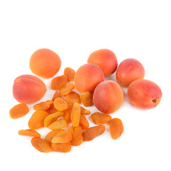 Ripe juicy apricots and dried apricots isolated on white.