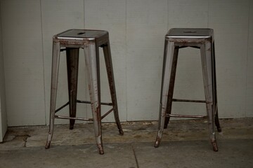 pair of metal farmhouse style  bar stools