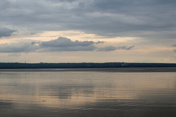 Beautiful autumn river. Gloomy windy day