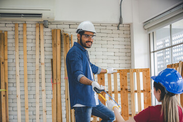 Carpenter working in carpentry shop. Carpenter working to making wood furniture in wood workshop