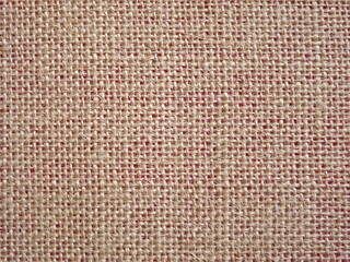 Jute fabric with pink undertone close-up as background. High quality photo