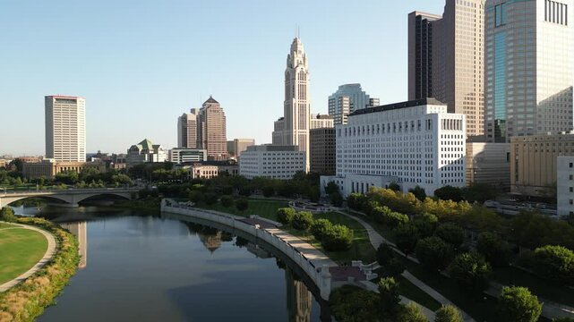 2024 4K downtown columbus city skyline on a sunny cinematic morning with the leveque tower lowering  to the left