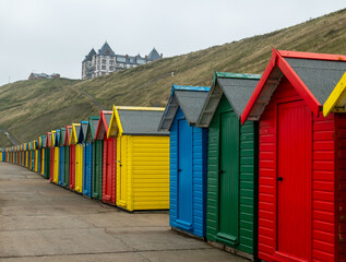 Colourful beach huts on Whitby promenade