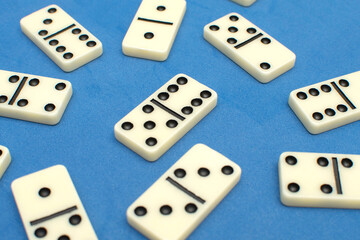 Dominoes bones on blue background	