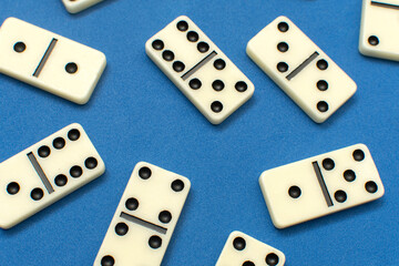 Dominoes bones on blue background	