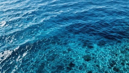 Fototapeta premium A serene view of clear blue ocean water, showcasing natural beauty and tranquility.
