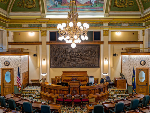 Helena, Montana, USA - August 19. 2024: The Dais and Chandelier in the Senate Chamber of the State Capitol