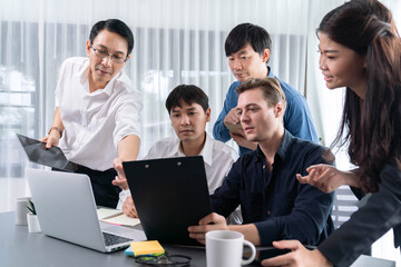 Group of diverse office worker employee working together on strategic business marketing planning in corporate office room. Positive teamwork in business workplace concept. Prudent