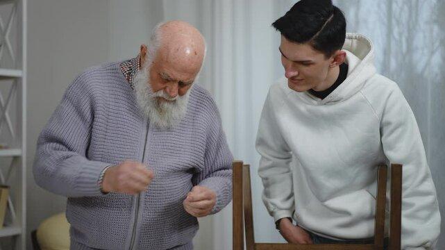 A heartwarming moment of a loving grandfather teaching his eager grandson invaluable DIY skills using various tools