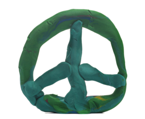 Plasticine in shape symbol of peace , modeling clay isolated on white, clipping